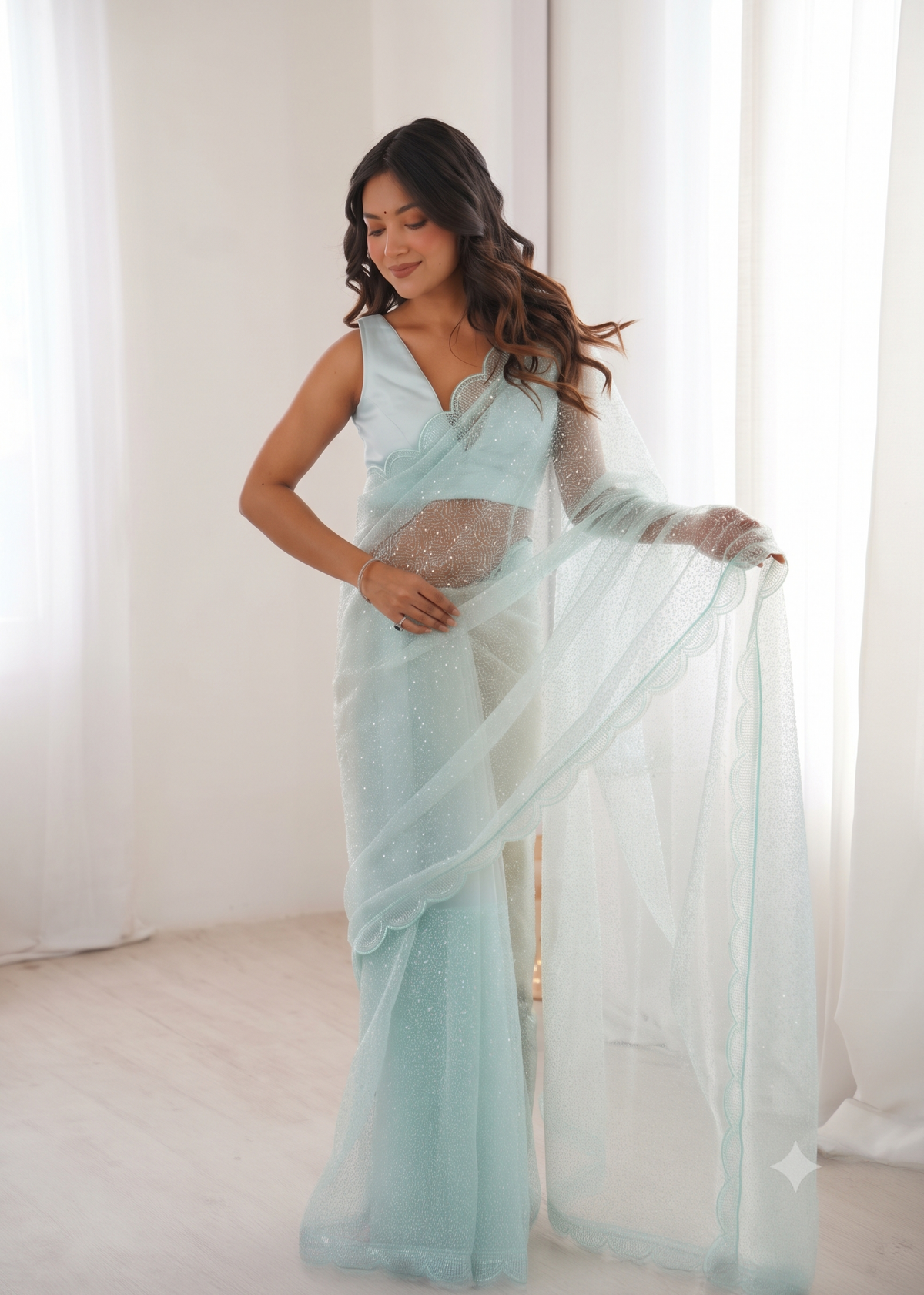 Embellished Net Saree with Intricate Tone-on-Tone Sequin Work and Scalloped Hemline with Unstitched Blouse