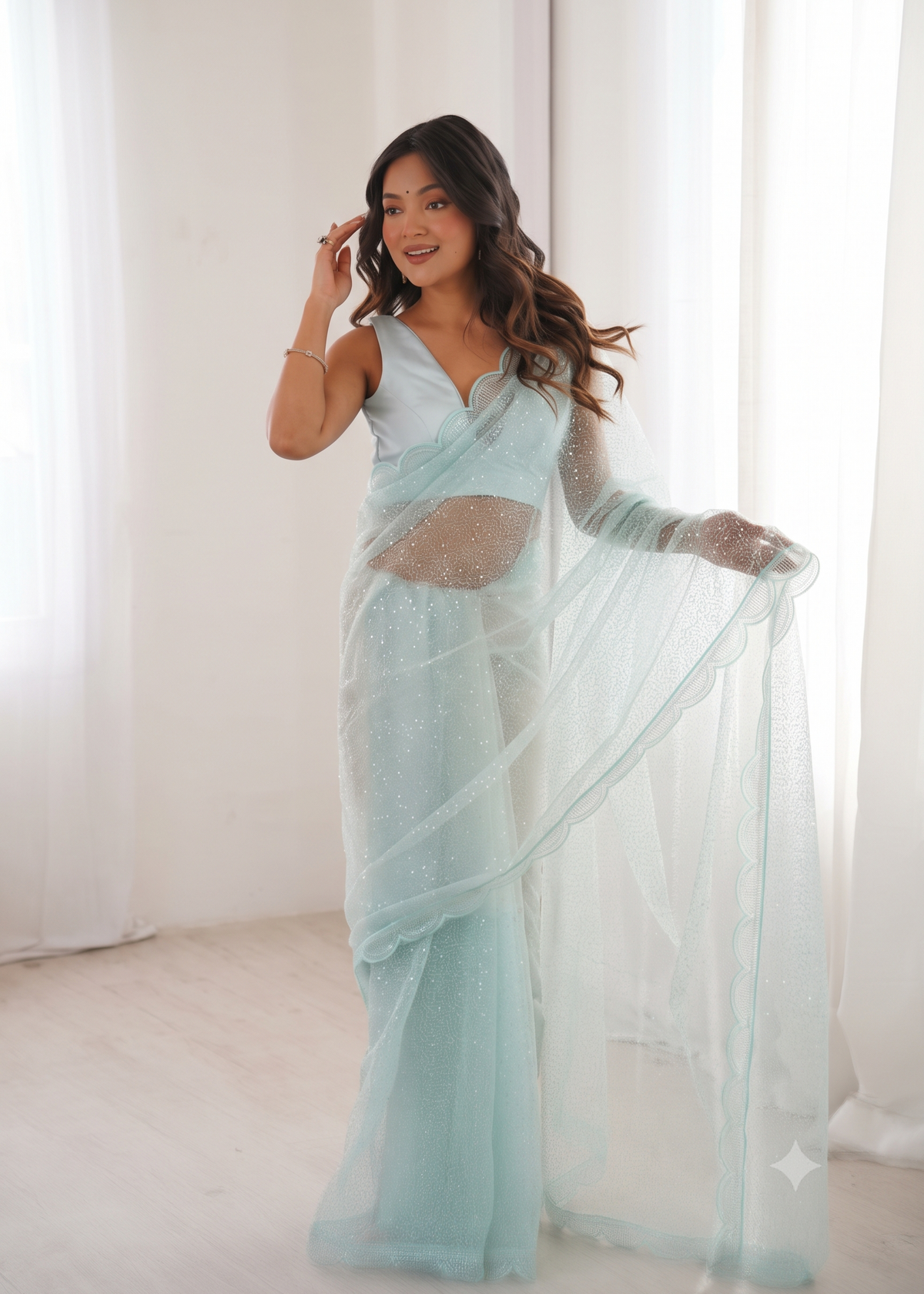 Embellished Net Saree with Intricate Tone-on-Tone Sequin Work and Scalloped Hemline with Unstitched Blouse
