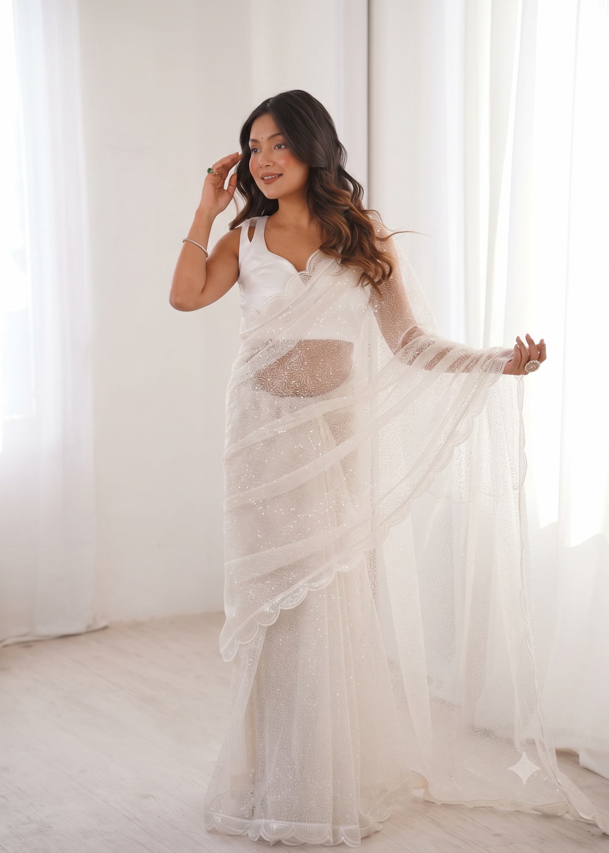Embellished Net Saree with Intricate Tone-on-Tone Sequin Work and Scalloped Hemline with Unstitched Blouse
