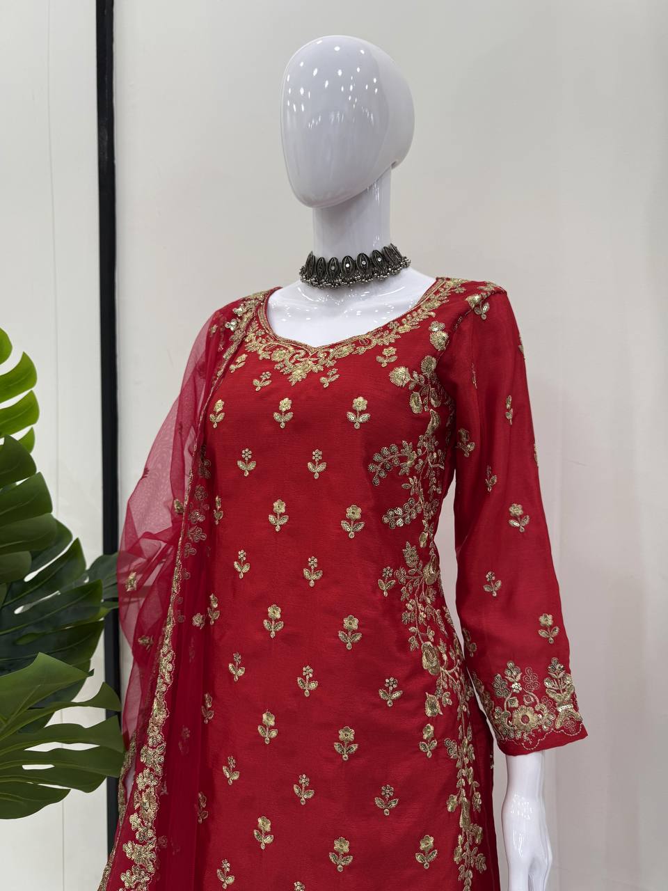 Royal Red Ensemble with Intricate Golden Threadwork Sharara Suit