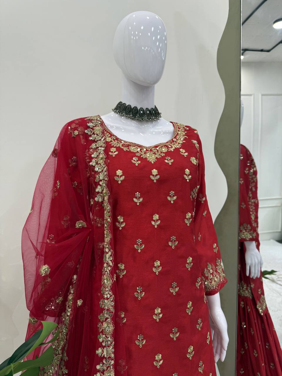 Royal Red Ensemble with Intricate Golden Threadwork Sharara Suit