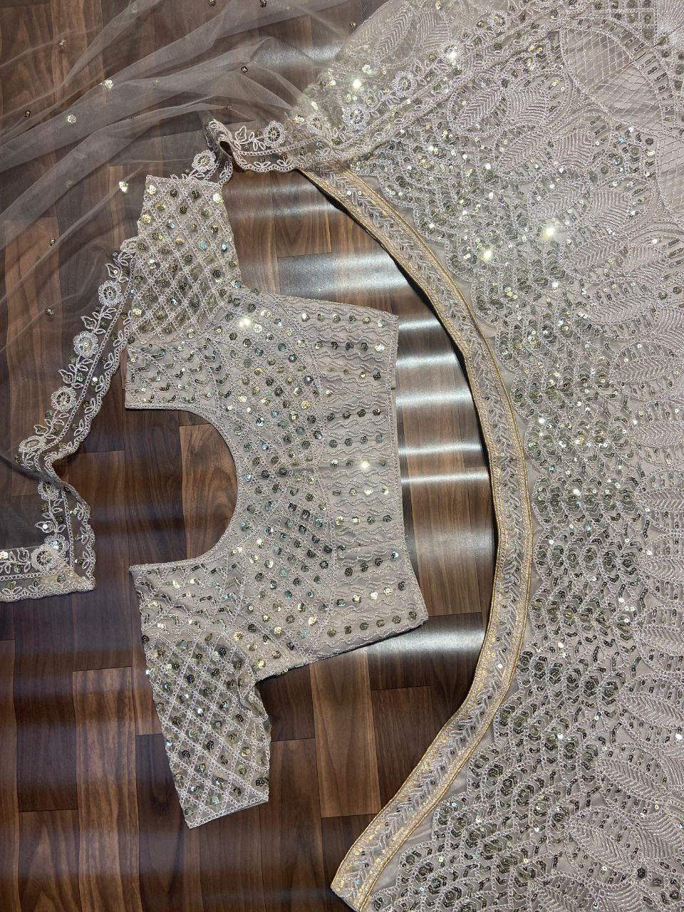 Biege Premium Net Embroidered Lehenga Choli
