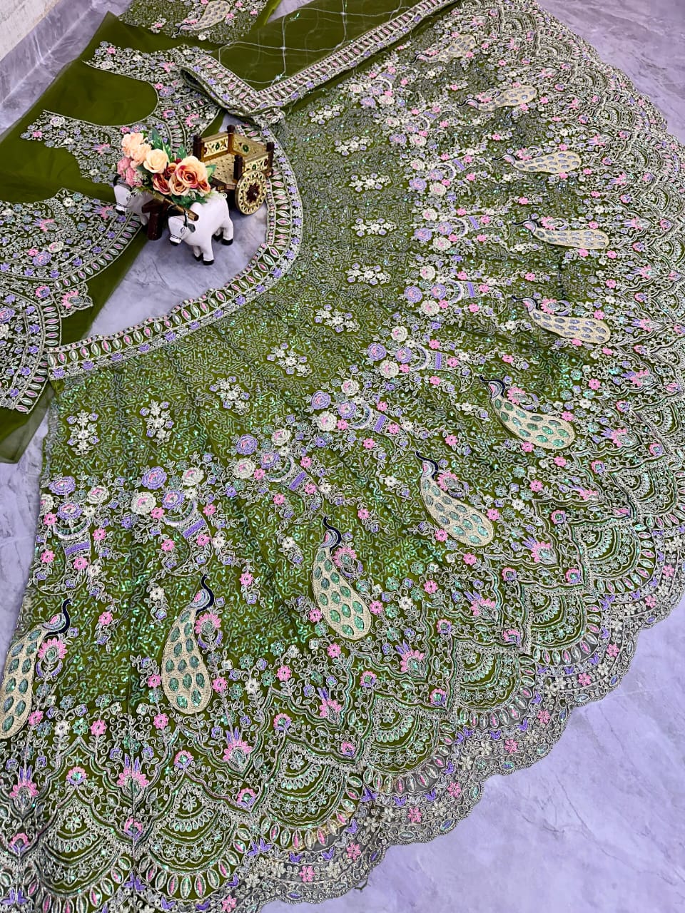 Peacock Design Light Sky Color Soft Net Coding Embroidered Work Lehenga Choli