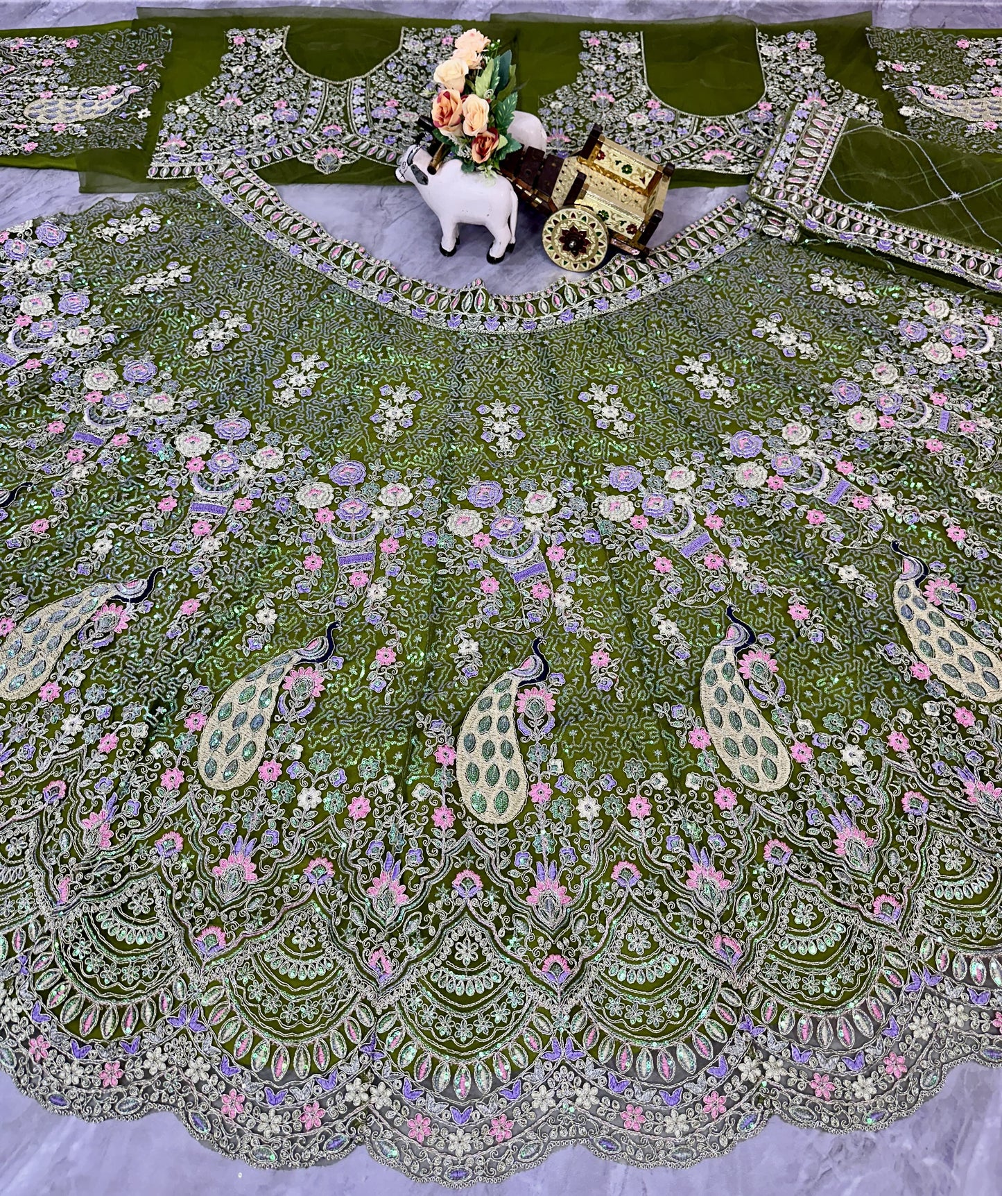 Peacock Design Light Sky Color Soft Net Coding Embroidered Work Lehenga Choli