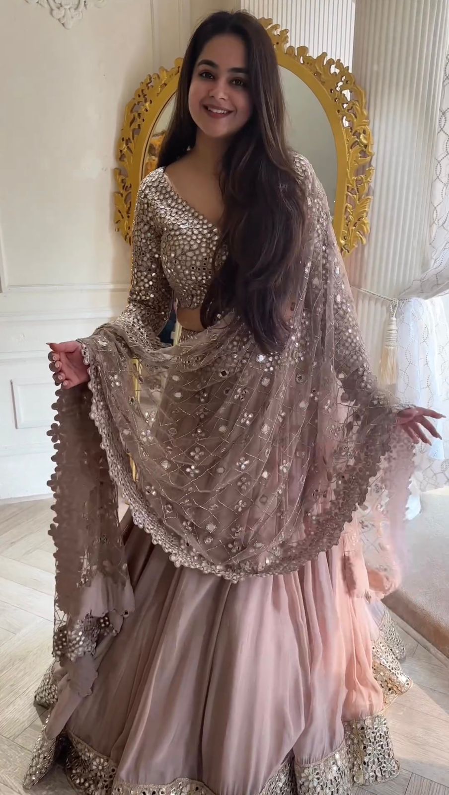 Glorious Peach Color Soft Net Embroidered Lehenga Choli For Women