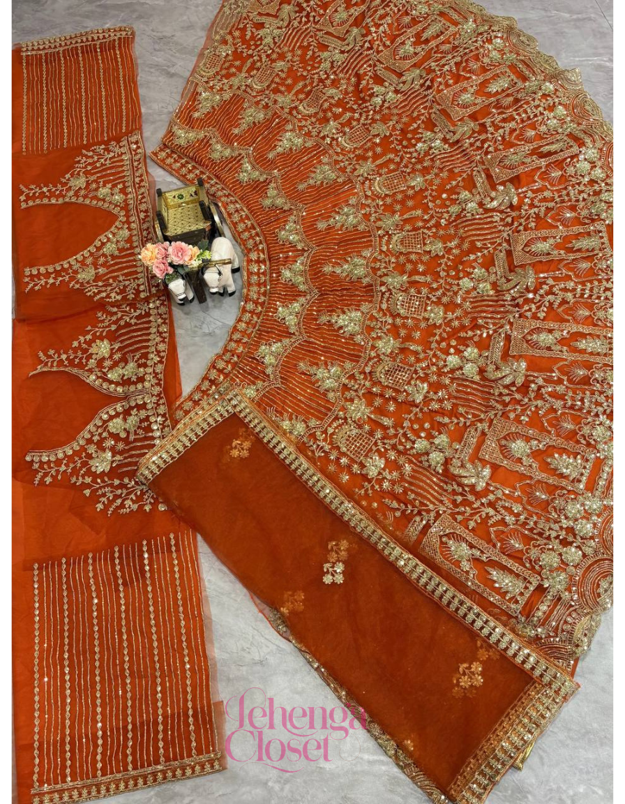 Orange Soft Net Sequence Dori Embroidered Lehenga Choli