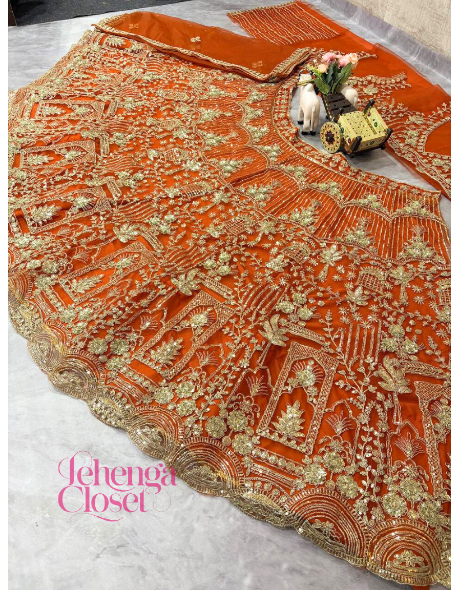 Orange Soft Net Sequence Dori Embroidered Lehenga Choli