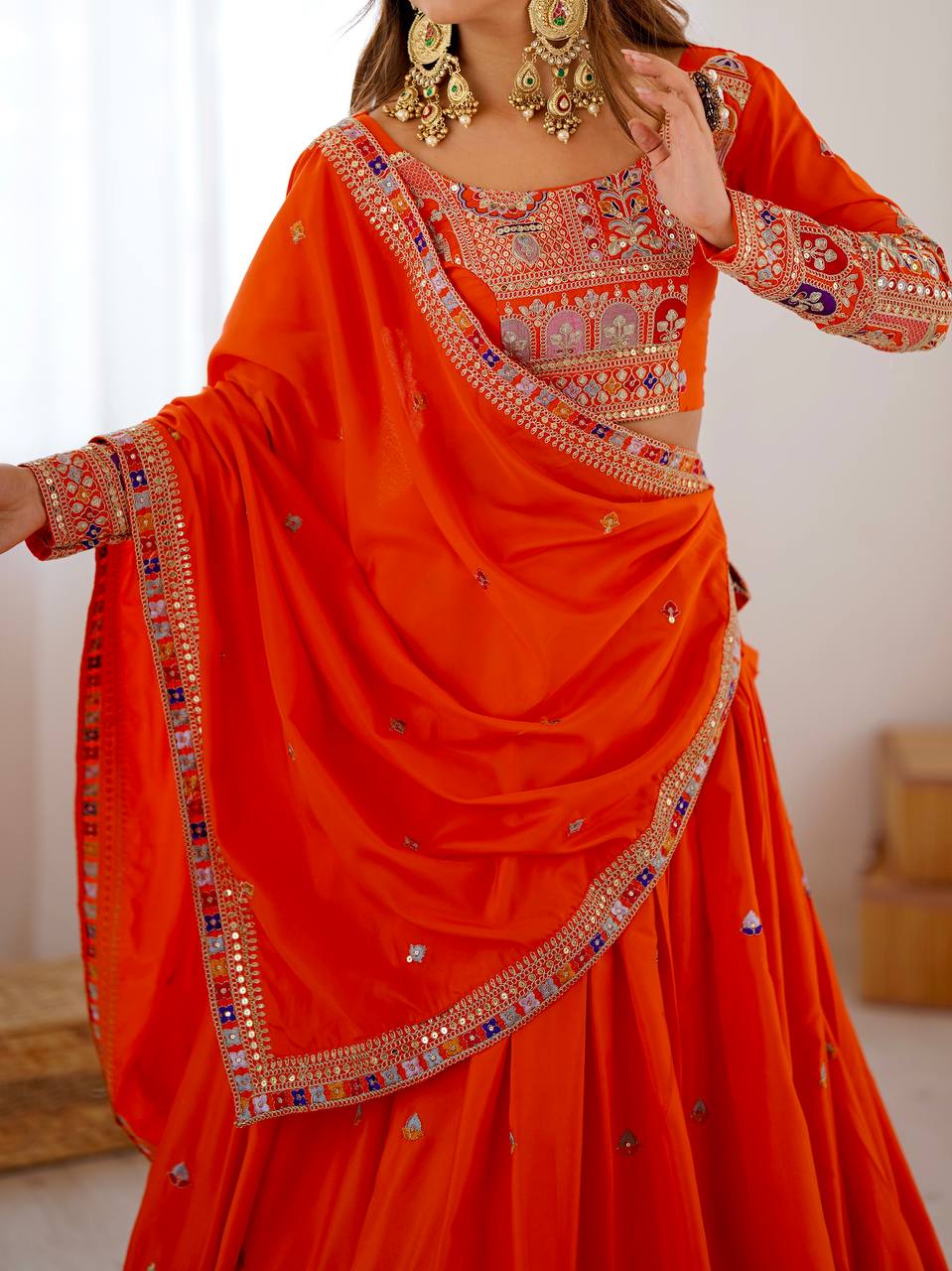 Orange Color Crep Silk Embroidered Semi Stitched Lehenga Choli