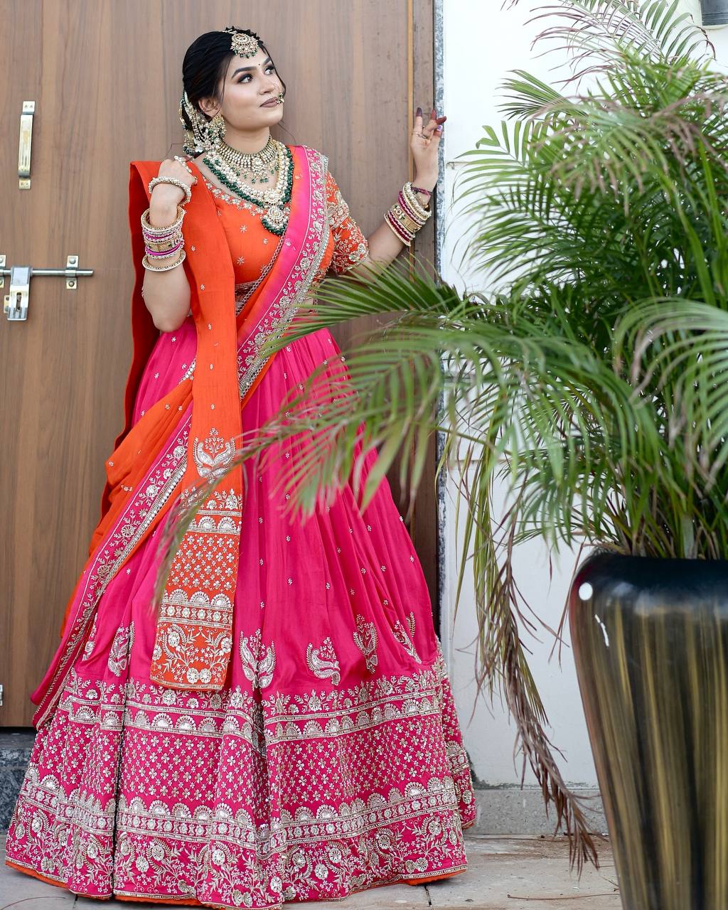 Graceful Pink And Orange Bridal Lehenga with Double Dupattas
