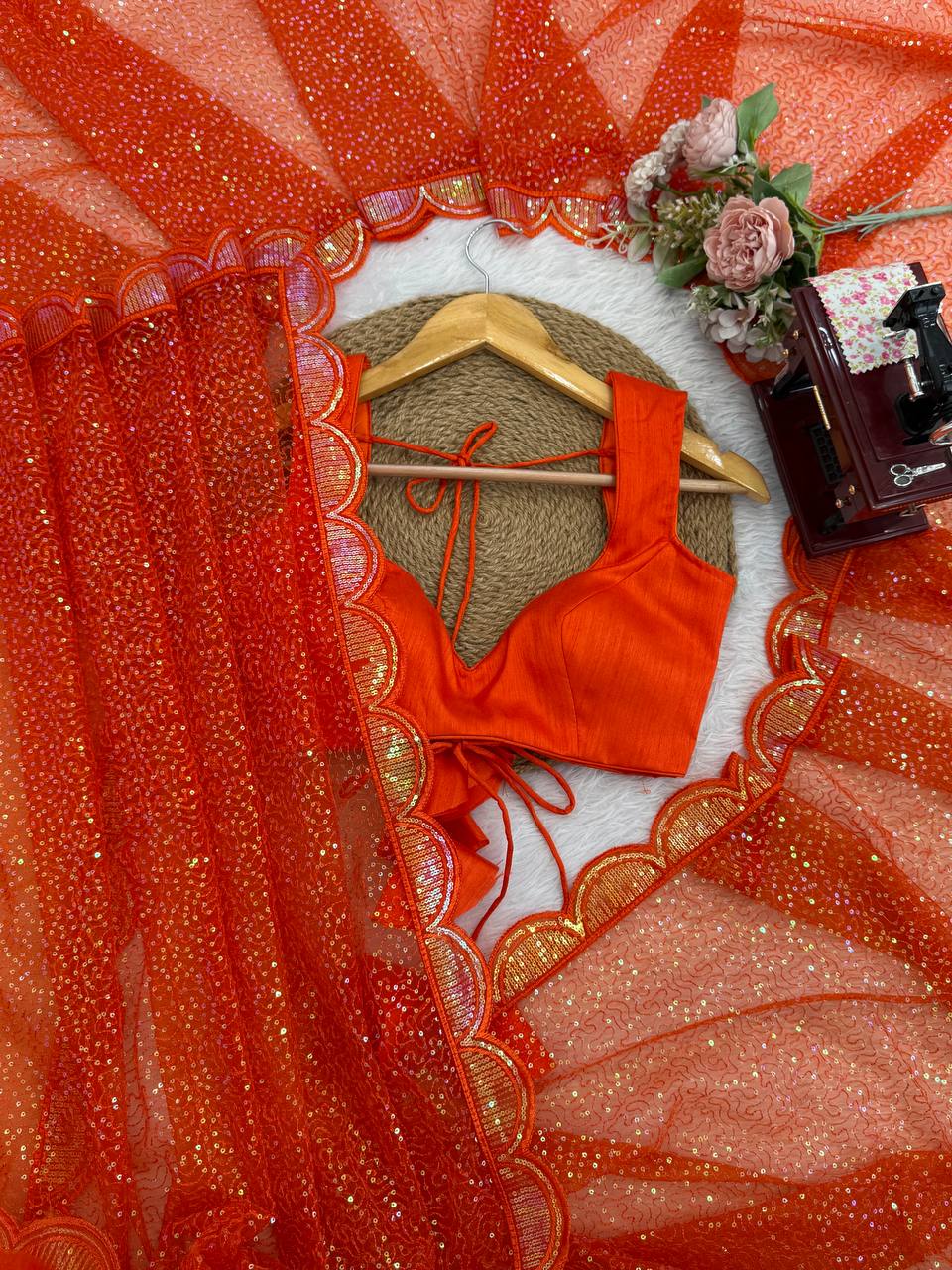 Embellished Net Saree with Intricate Tone-on-Tone Sequin Work and Scalloped Hemline with Unstitched Blouse