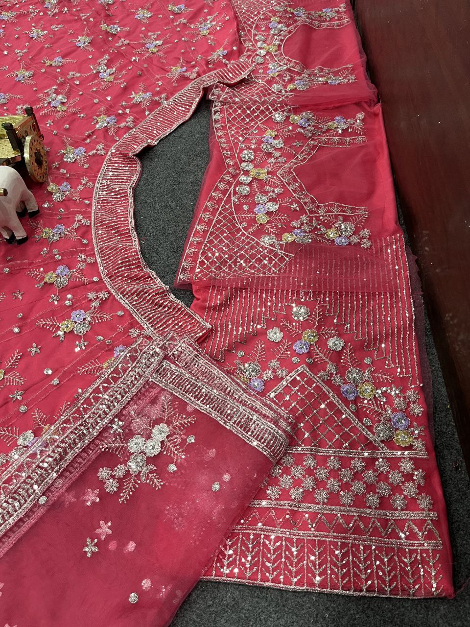 Carrot Pink Soft Net Sequence Semi Stitched Lehenga Choli