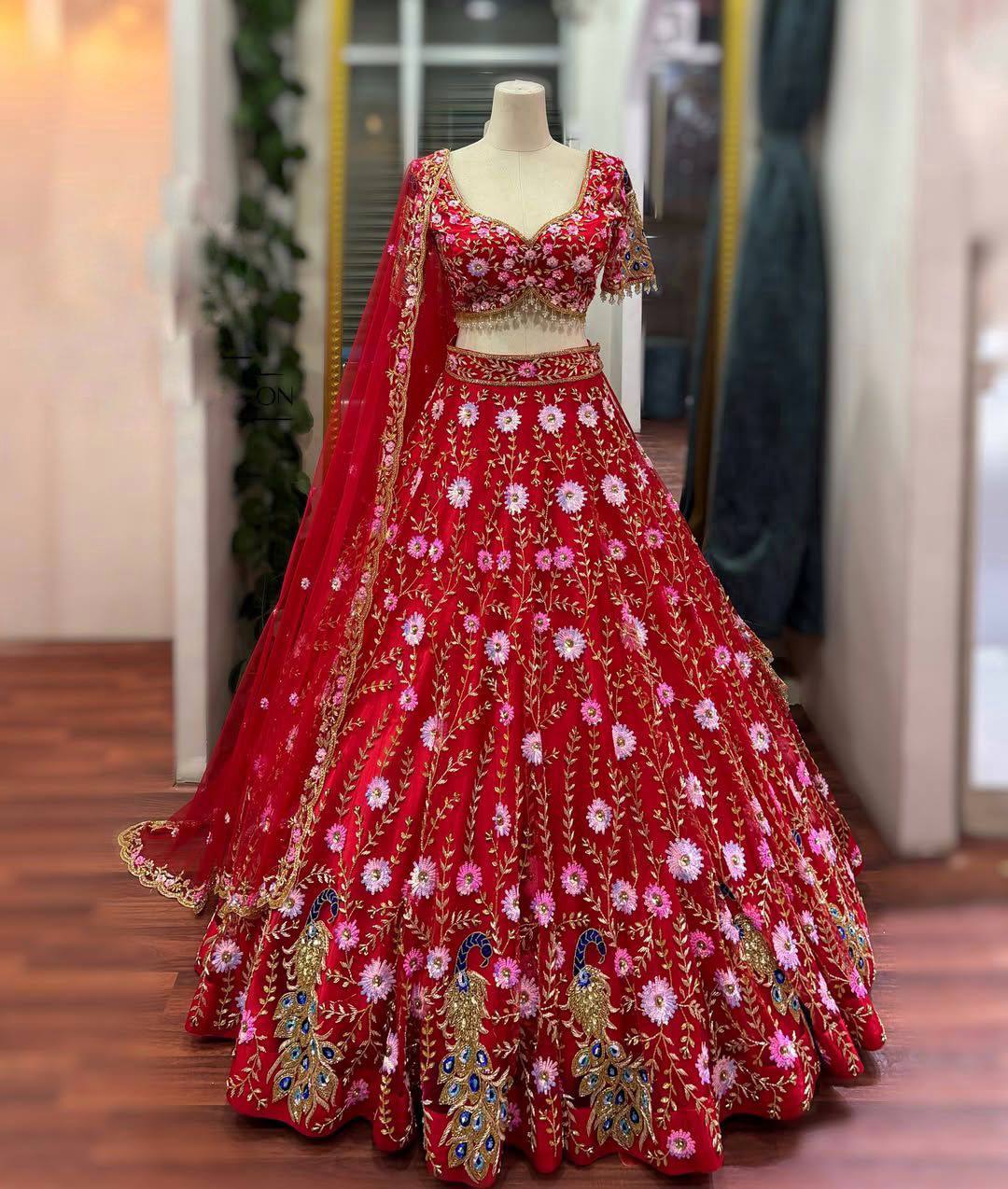 Elegant Red Net Embroidered with Sequins & Peacock Motifs Lehenga Choli