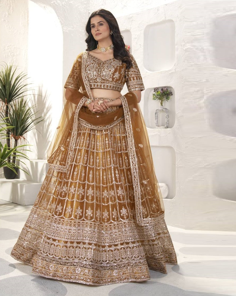 Rust Color Soft Net Dori Embroidered Work Lehenga Choli