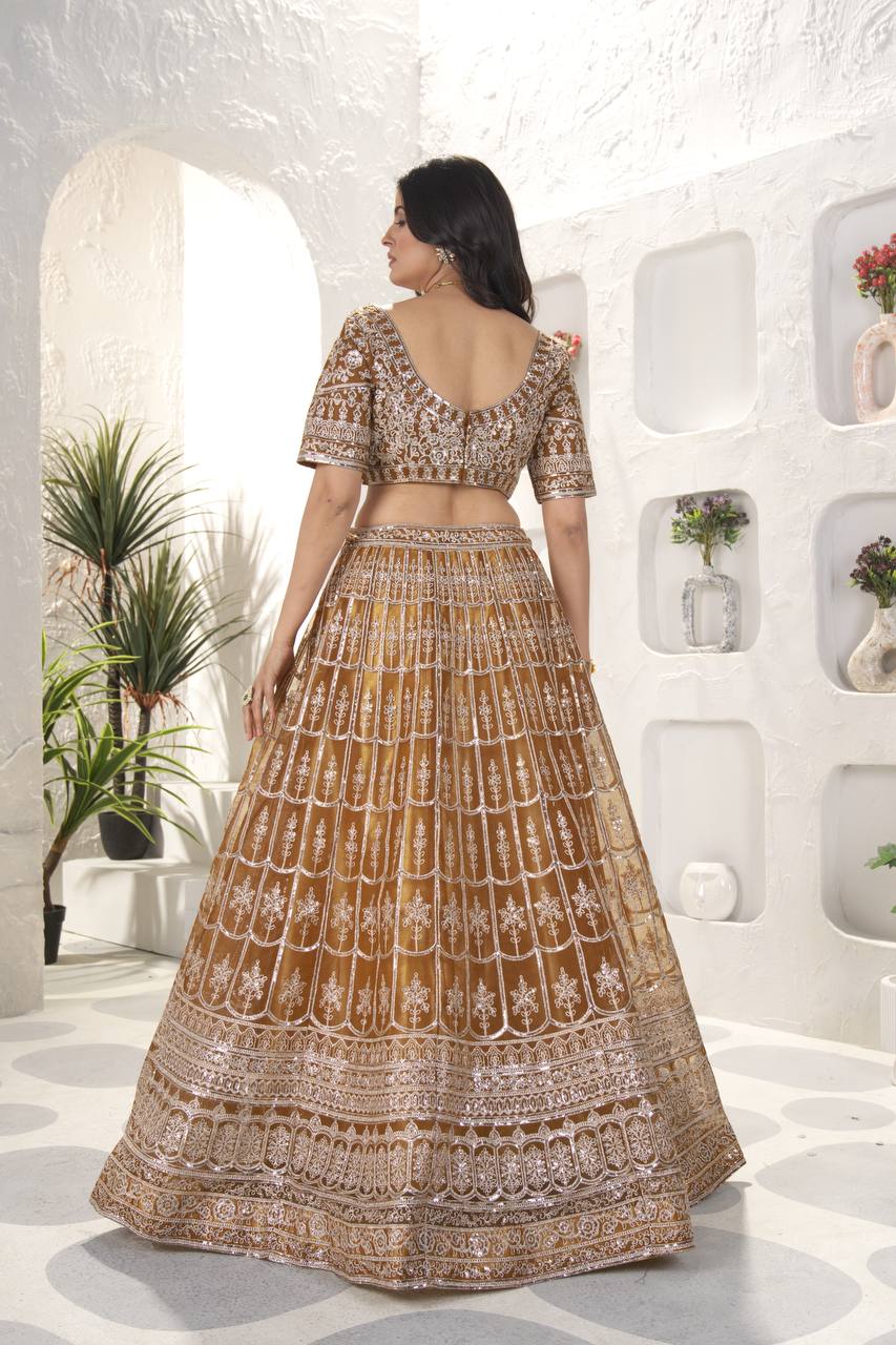 Rust Color Soft Net Dori Embroidered Work Lehenga Choli