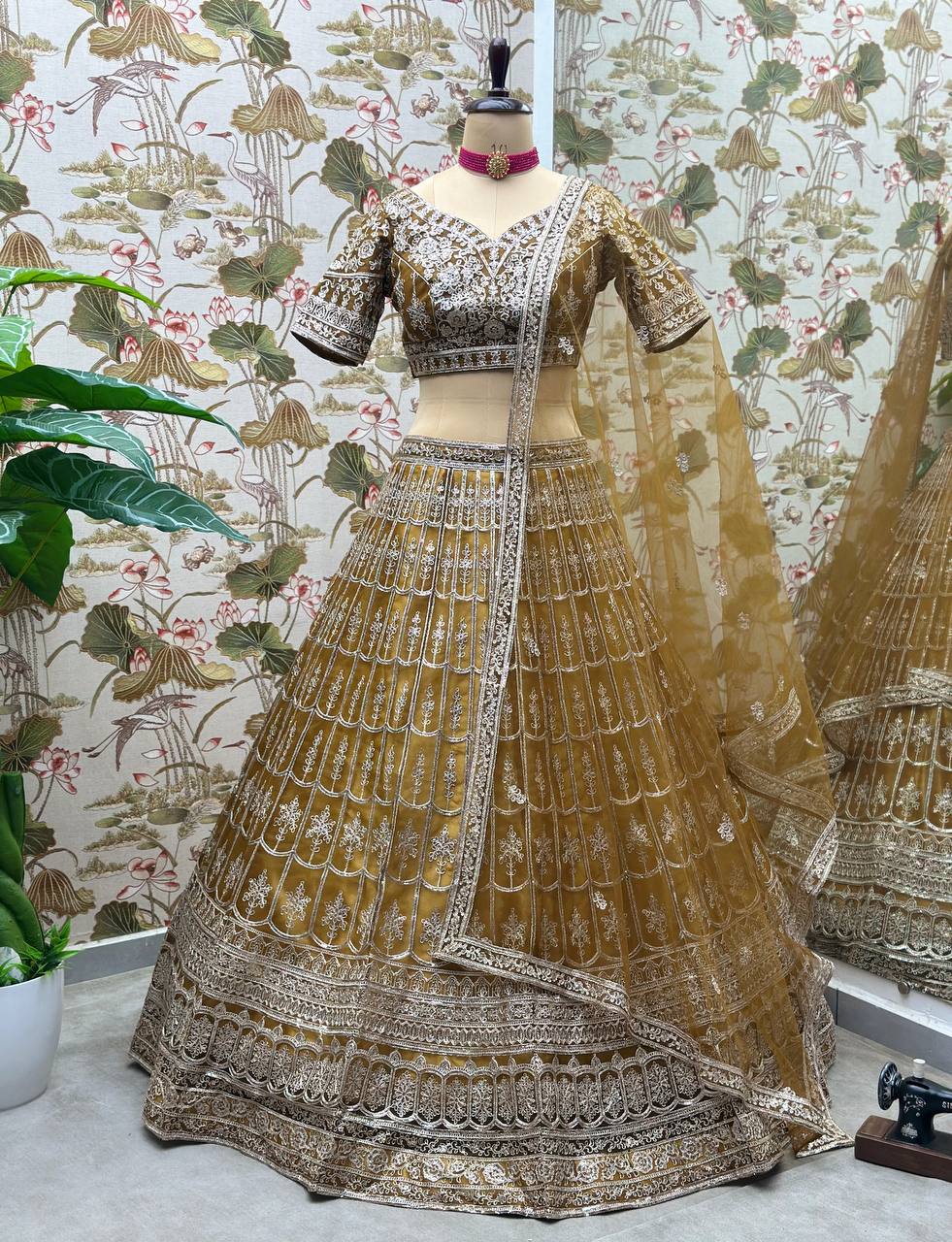 Rust Color Soft Net Dori Embroidered Work Lehenga Choli
