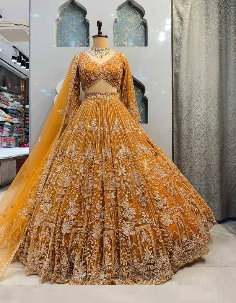 Wedding Wear Mustard Color Heavy Embroidered Lehenga Choli