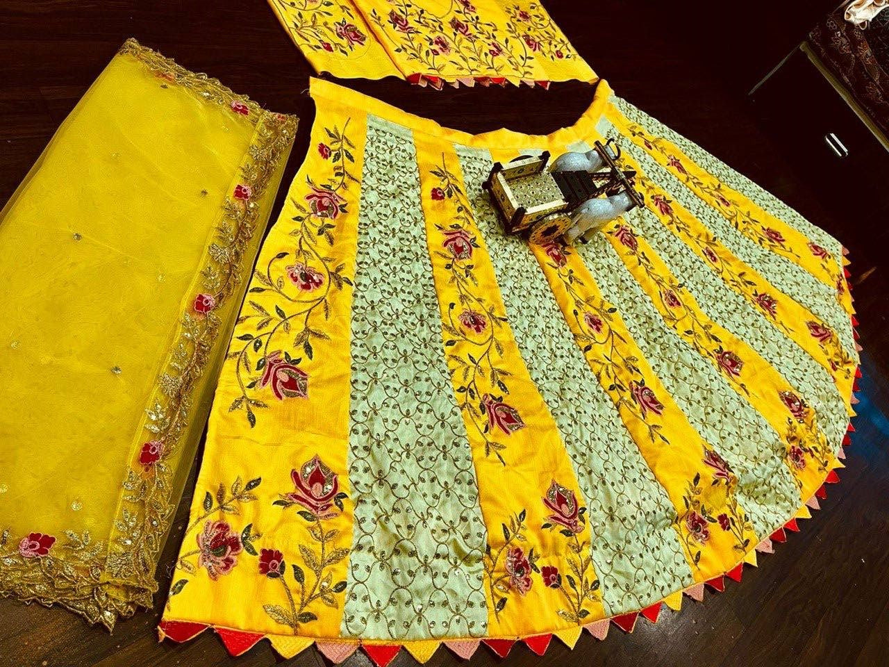 Lovely Yellow Color Silk Semi Stitched Lehegna Choli