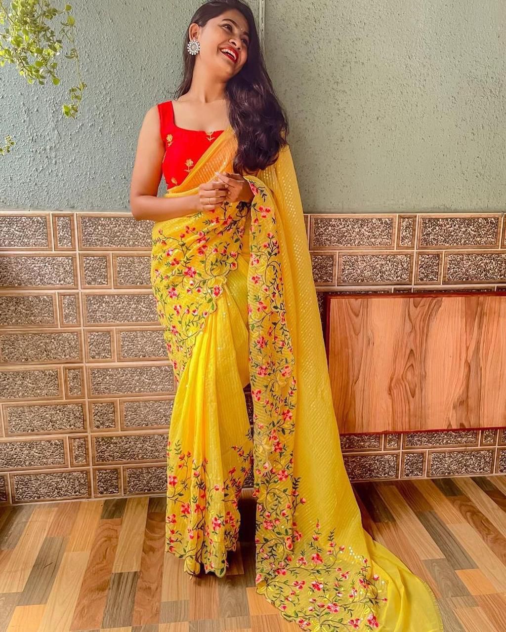 Artistic Yellow Color Regular Wear Georgette Sequence Work Saree Blouse