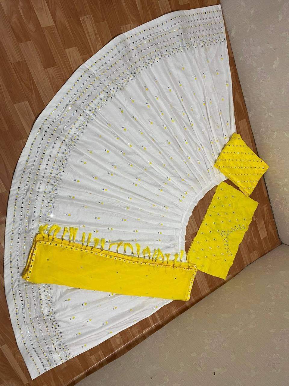 Enamoring White Color Rayon Design Mirror Embroidered Work Lehnega Choli