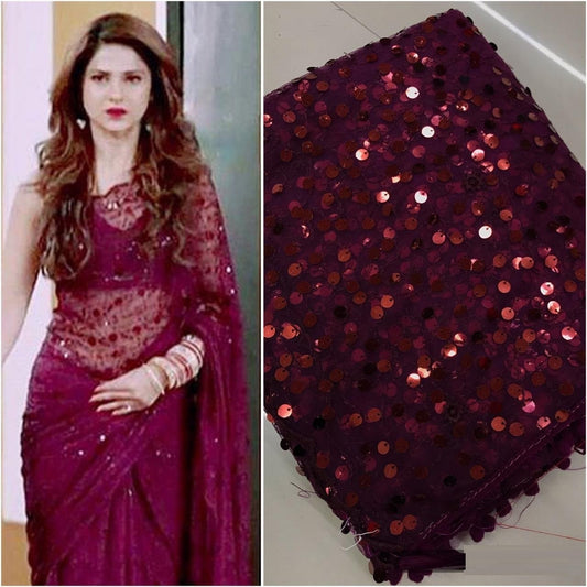 Graceful Function Wear Wine Color Net Saree With Sequence Work.