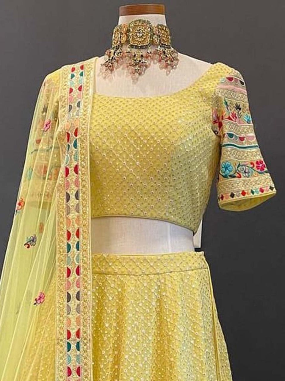 Pleasant Yellow Color Festive Wear Thread Multi Work Georgette Lehenga Choli