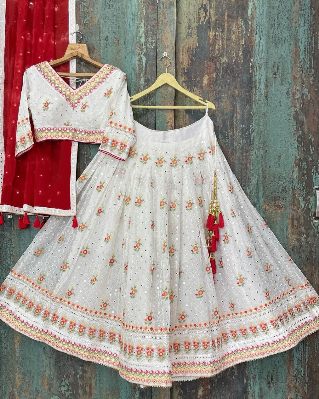 Stunning White Color Georgette Mirror Work Wedding Wear Lehenga Choli For Women
