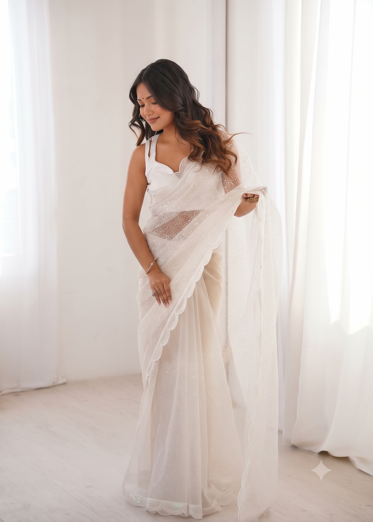 Embellished Net Saree with Intricate Tone-on-Tone Sequin Work and Scalloped Hemline with Unstitched Blouse