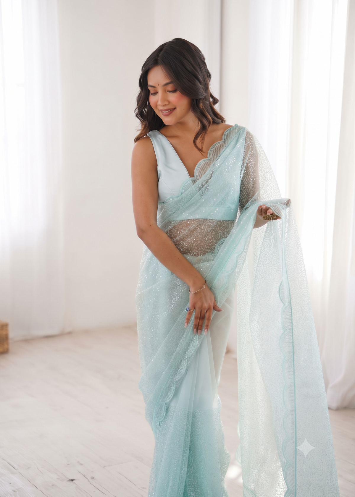 Embellished Net Saree with Intricate Tone-on-Tone Sequin Work and Scalloped Hemline with Unstitched Blouse