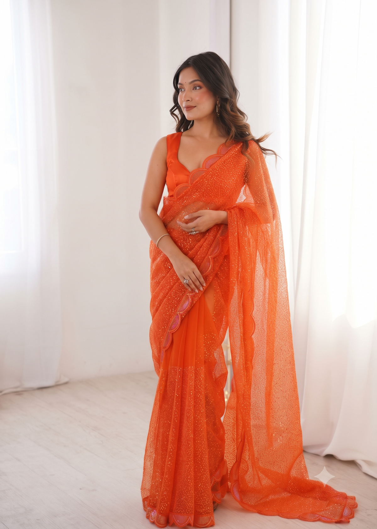 Embellished Net Saree with Intricate Tone-on-Tone Sequin Work and Scalloped Hemline with Unstitched Blouse