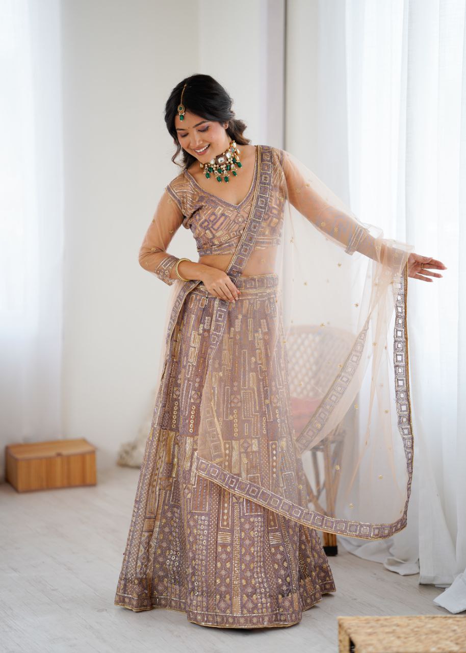 Soft Butterfly Net Peach Colour Wedding Wear Lehenga Choli