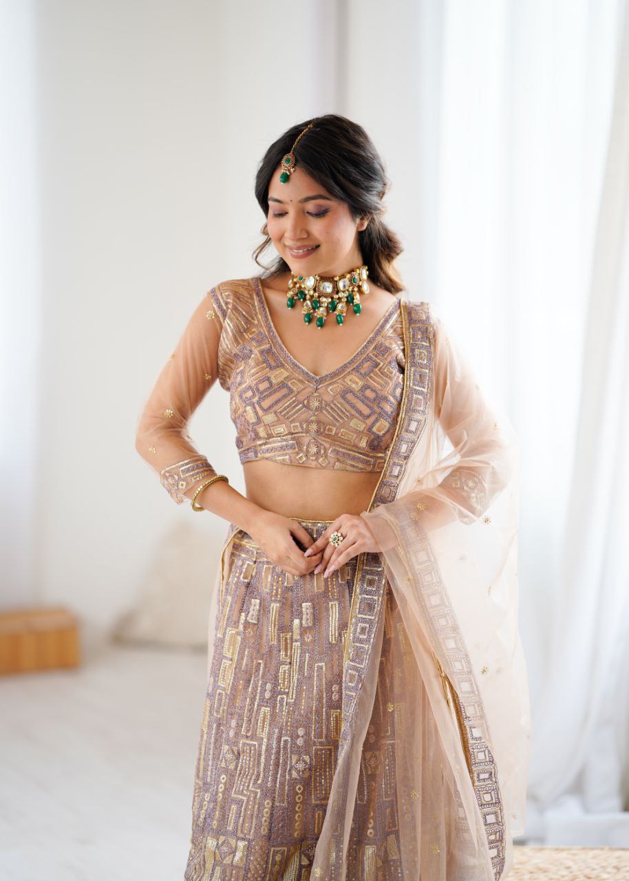 Soft Butterfly Net Peach Colour Wedding Wear Lehenga Choli