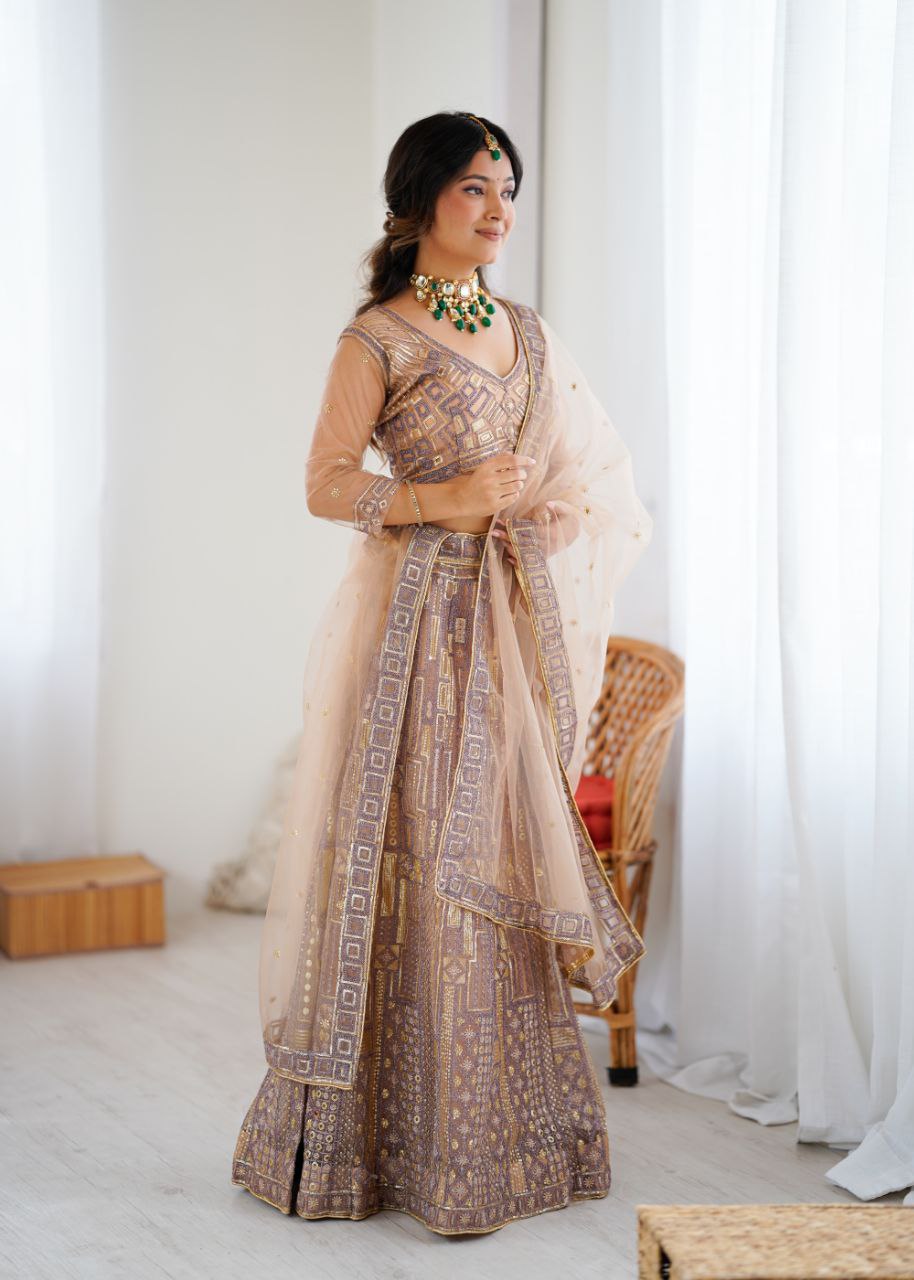 Soft Butterfly Net Peach Colour Wedding Wear Lehenga Choli
