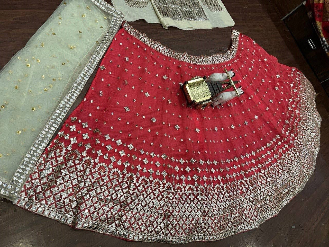 Pink Color Net Embroidered Lehenga Choli