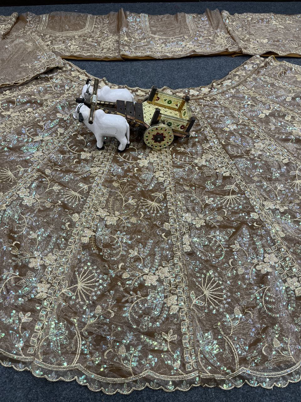 Coffee Color Shining Net Lehenga Choli