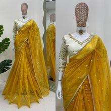 Load image into Gallery viewer, Haldi Wear Twill Net Saree With Stitched Heavy Thread Sequence Work Blouse
