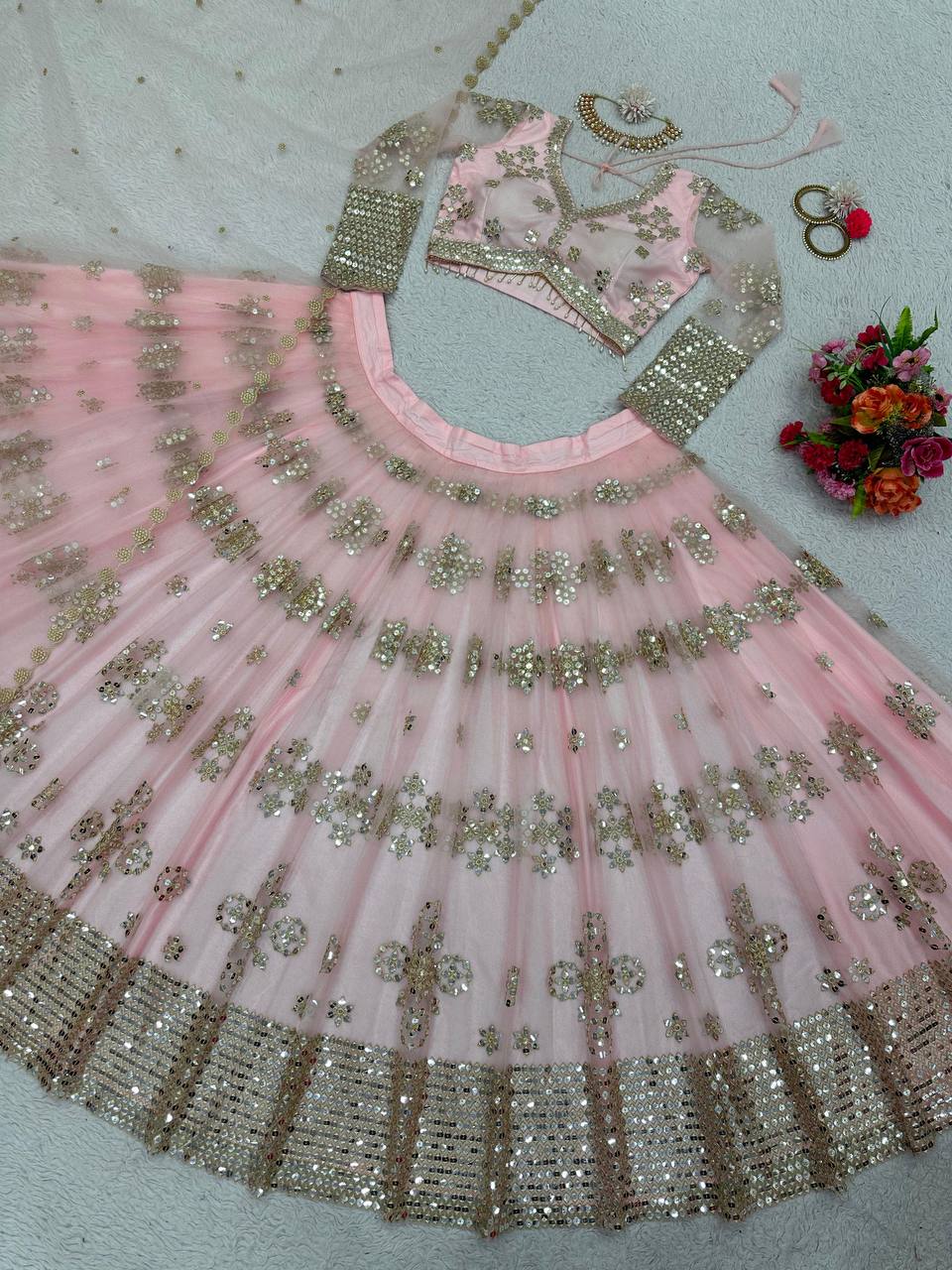 Bewildering Pink Color Wedding Wear Net Chine Semi Stitched Work Lehenga Choli