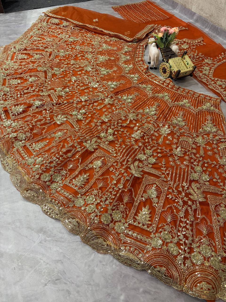Orange Heavy Embroidered Lehenga Choli