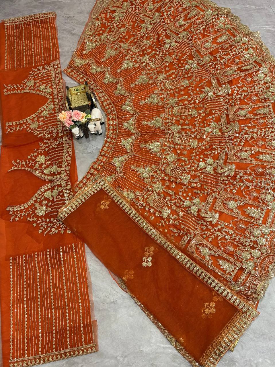 Orange Heavy Embroidered Lehenga Choli