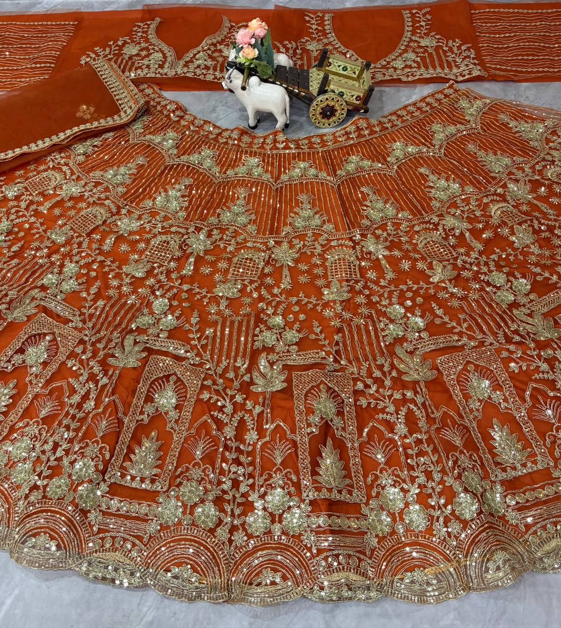 Orange Heavy Embroidered Lehenga Choli