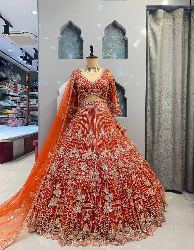 Orange Heavy Embroidered Lehenga Choli