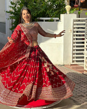 Load image into Gallery viewer, Wedding Wear Red Color Faux Georgette Heavy Embroidered Semi Stitched Lehenga Choli
