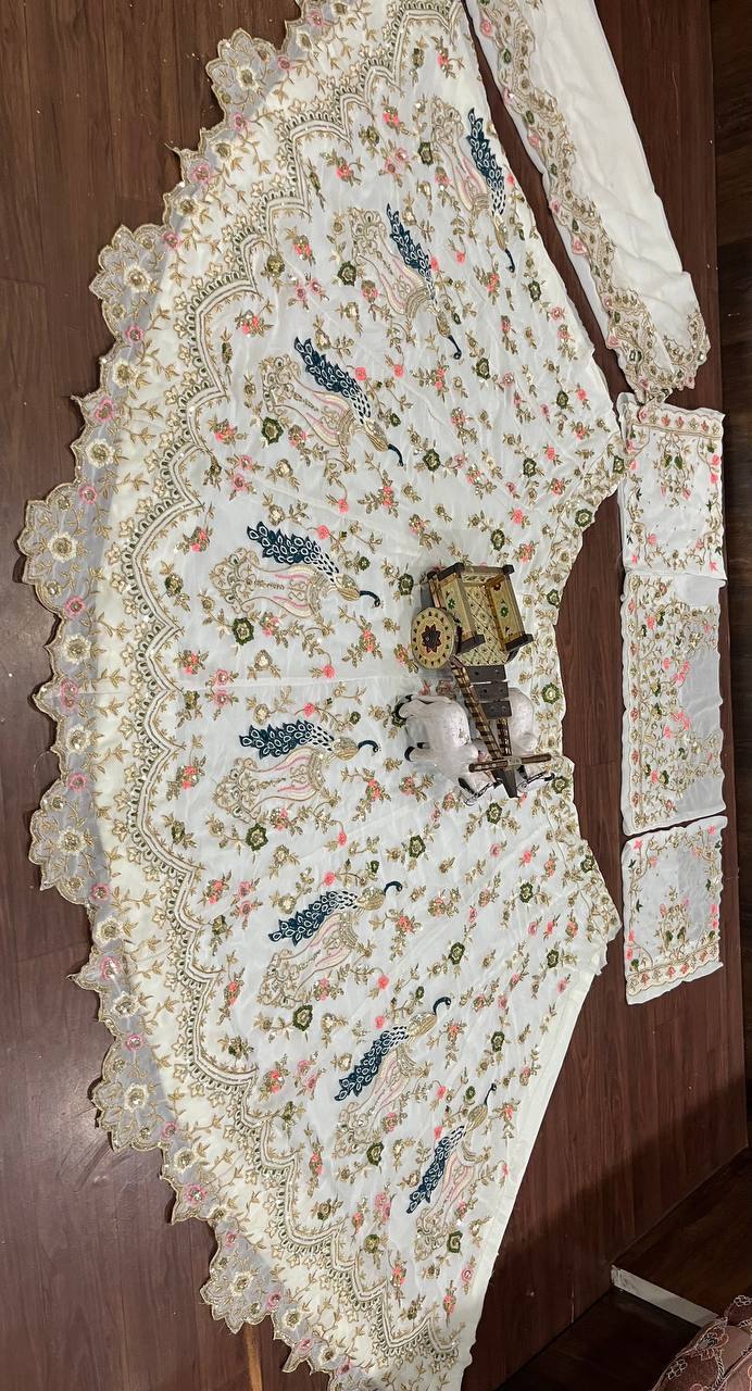 Bridal Wear White Georgette Heavy Embroidered Semi Stitched Lehenga Choli