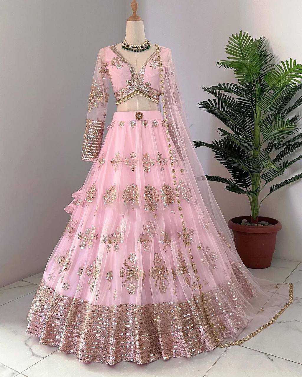 Bewildering Pink Color Wedding Wear Net Chine Semi Stitched Work Lehenga Choli