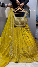 Load image into Gallery viewer, Fancy Yellow Georgette Embroidary Worked Lehanga Choli
