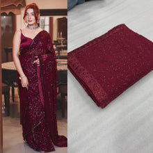 Load and play video in Gallery viewer, Maroon Georgette Sequence Embroidered Party Wear Saree
