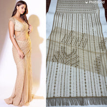 Load image into Gallery viewer, Suhana Wear Skin Color Sequence Work Net Saree
