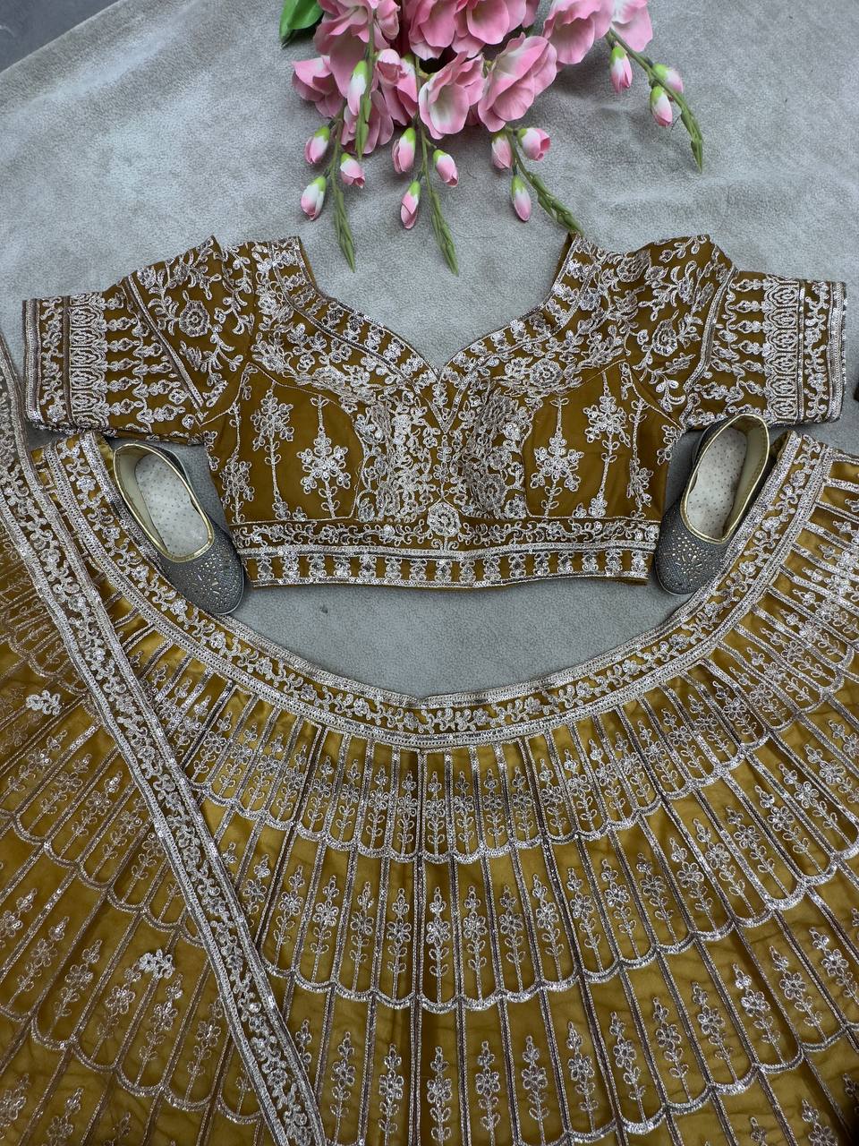 Rust Color Soft Net Dori Embroidered Work Lehenga Choli