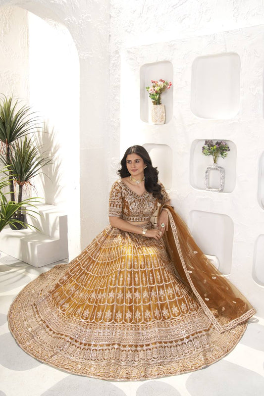 Rust Color Soft Net Dori Embroidered Work Lehenga Choli