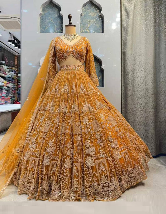 Wedding Wear Mustard Color Heavy Embroidered Lehenga Choli