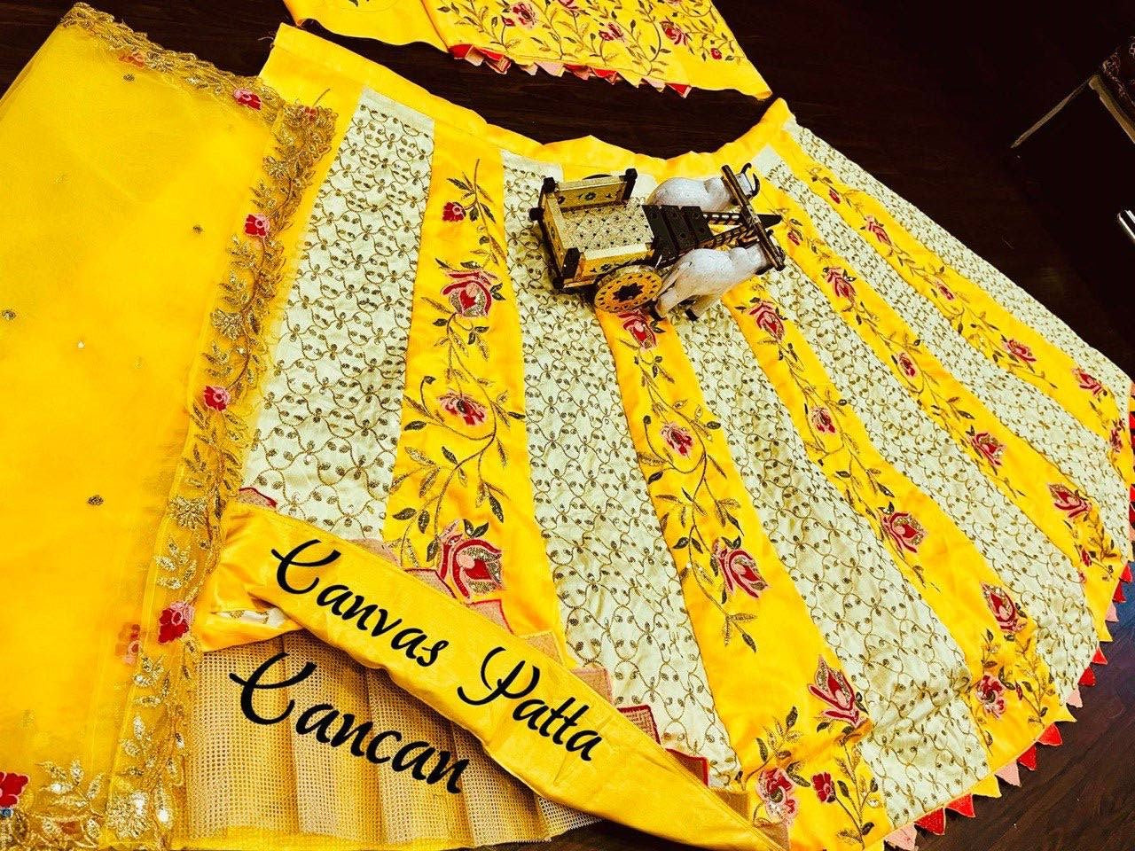 Lovely Yellow Color Silk Semi Stitched Lehegna Choli